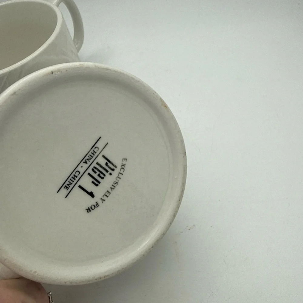 Pair Of Pier 1 Coffee Mugs White raised Fruit grape pears strawberries design
